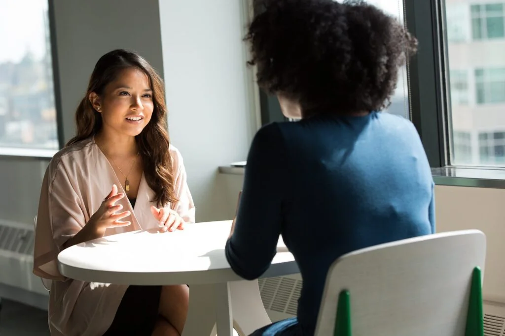 Friends talking over a table